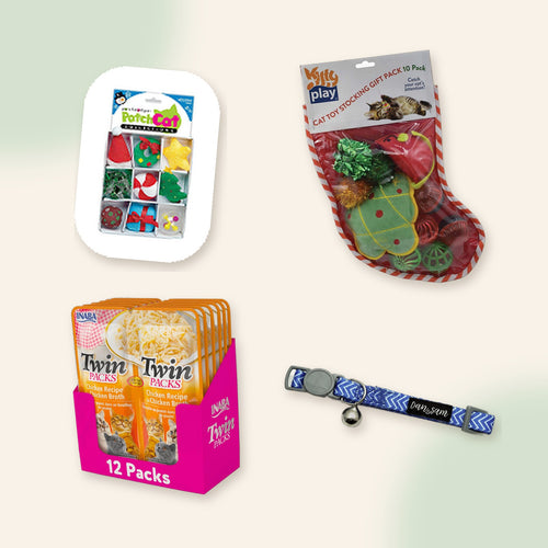 Meow Christmas Gift Box flat lay: Christmas cat toy box, cat toy stocking, Inaba twin packs treats and Ziggy cat collar